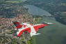 Kig op: 'Verdens hurtigste Dannebrog' flyver over hele landet